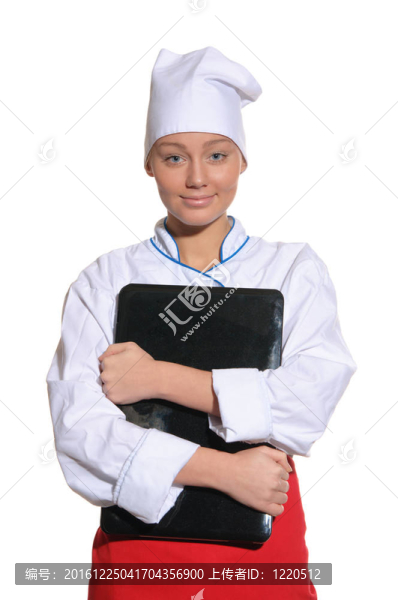 快樂(lè)女人用筆記本做飯