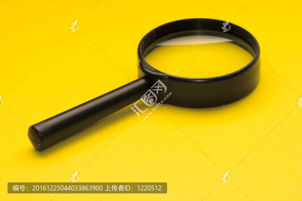 黃色背景放大鏡