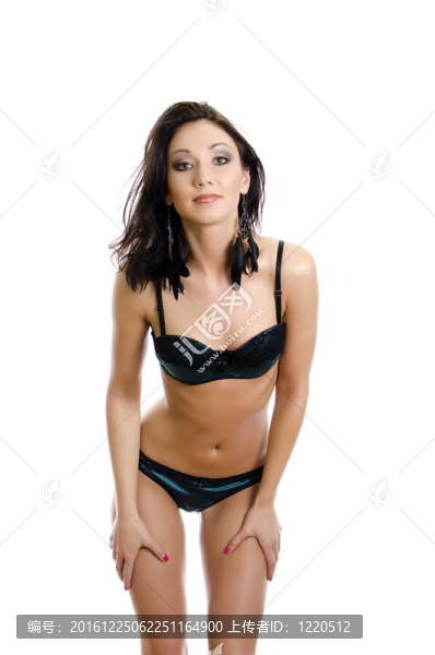 美麗的年輕女子穿著綠色內(nèi)衣。白色隔離。