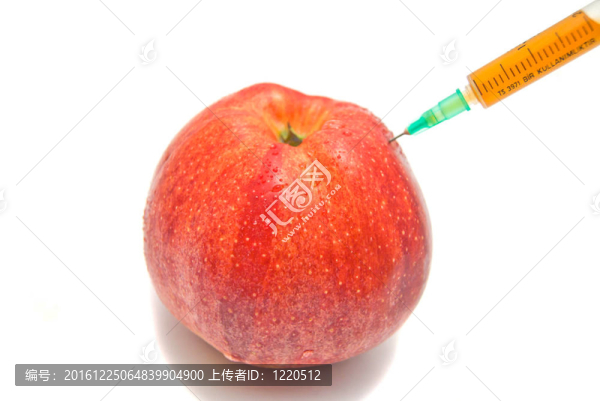 紅蘋果和注射器近白