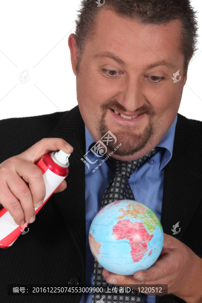 商人噴灑地球儀的肖像