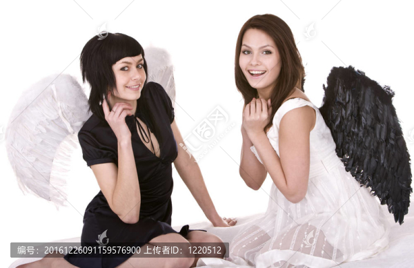 天使服裝中的兩個女孩。分離。