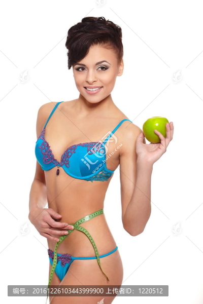 美麗的微笑的黑發(fā)白衣女人內(nèi)衣蘋果綠測量完美形狀孤立在白色的肖像