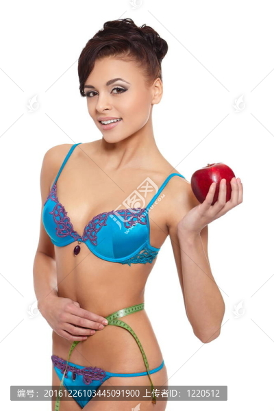 美麗的微笑的黑發(fā)白衣女人內(nèi)衣紅蘋果測量形狀孤立在白色的肖像