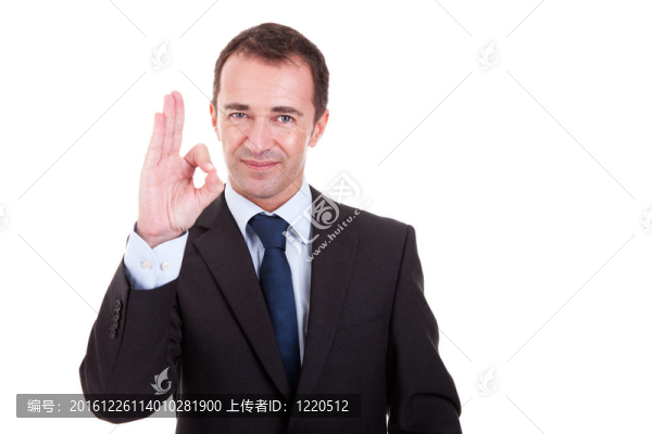 英俊的商人豎起大拇指以示索；孤立在白色背景。工作室拍攝