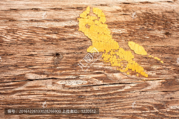 黃色油漆飛濺的木材