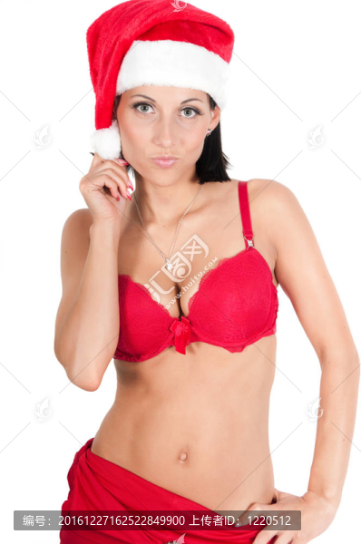 美麗的女人在紅色圣誕老人的帽子
