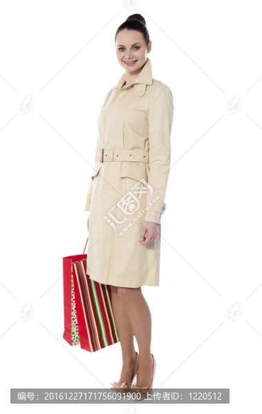 可愛的女人與購物袋