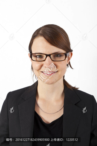 商業(yè)婦女面帶微笑和期待嚴(yán)重
