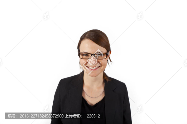 商業(yè)婦女面帶微笑和期待嚴(yán)重