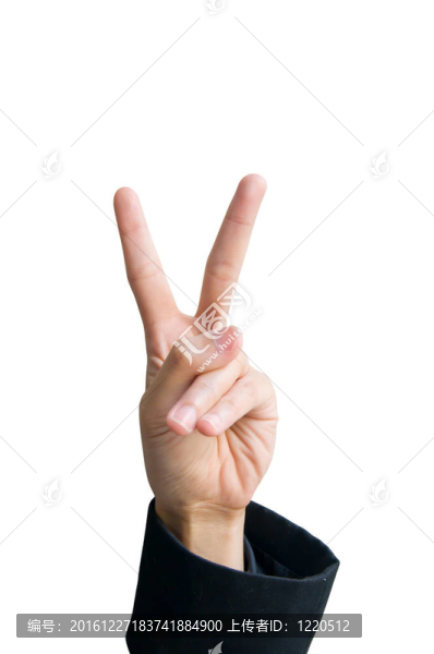 兩只手指插在豌豆上