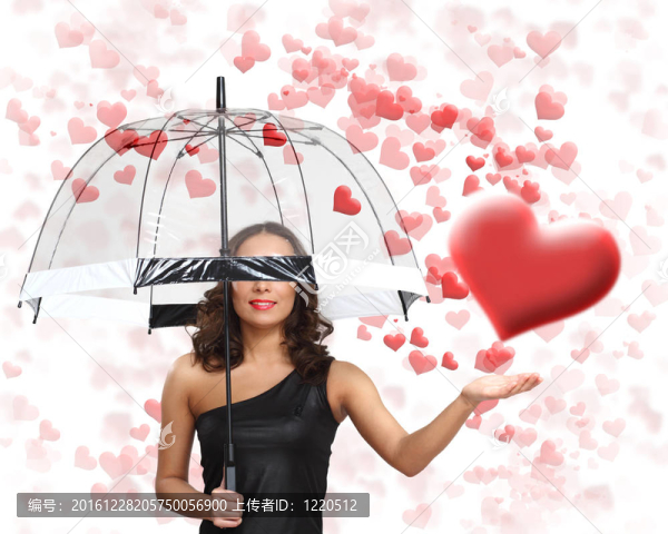 漂亮的年輕女人帶著雨傘和心