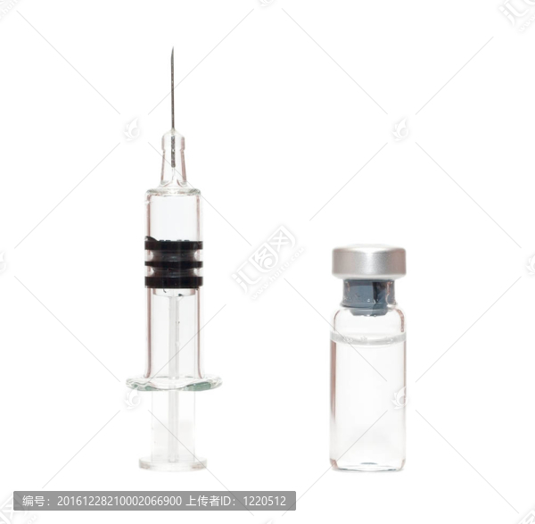 在白色的注射器和小瓶