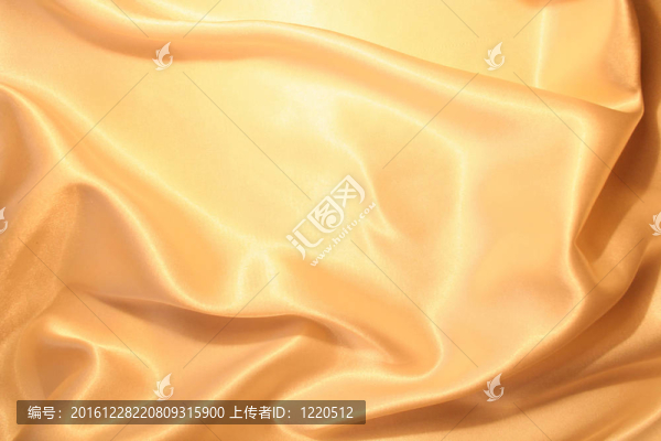 光滑典雅的金色絲綢為背景