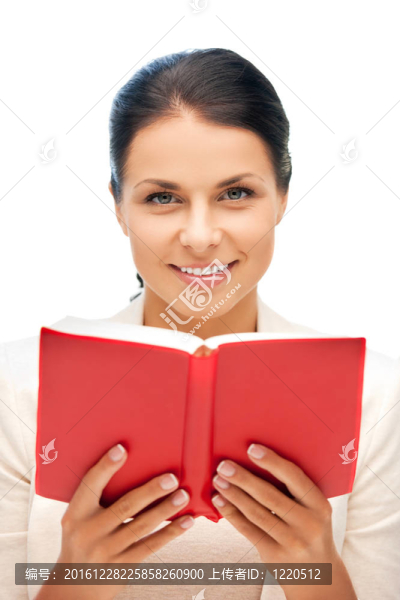 快樂微笑的女人與書