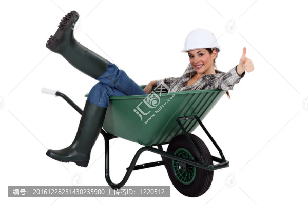 女瓦工坐在手推車大拇指