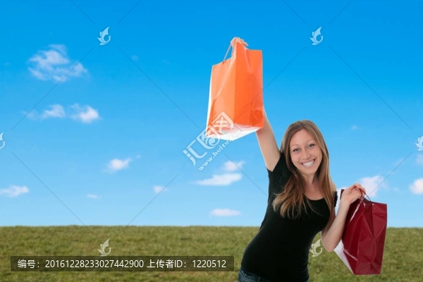 婦女與購物袋外