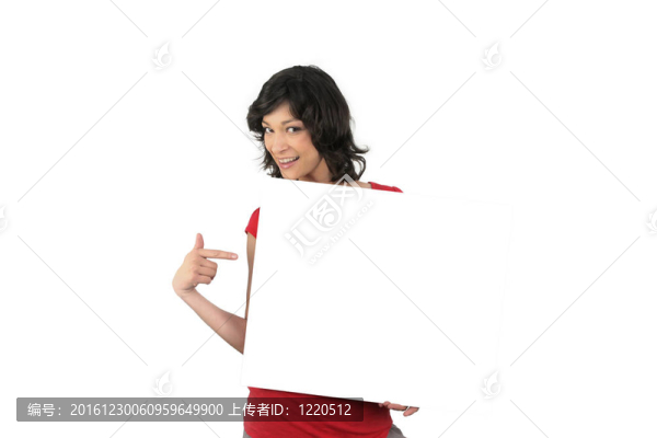 熱情的女人指著一個(gè)空白的標(biāo)志