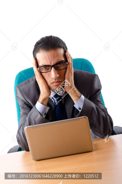商人坐在辦公桌旁