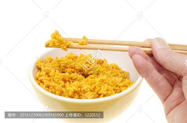 手握筷子和米飯