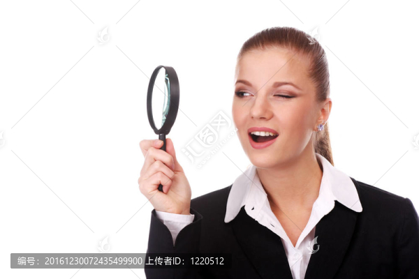 帶放大鏡的女商人