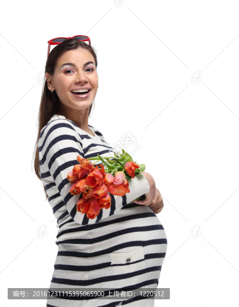 快樂懷孕的女人與郁金香