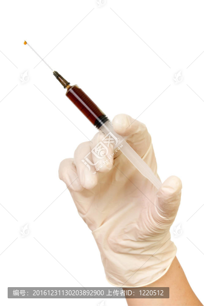 帶注射器的手