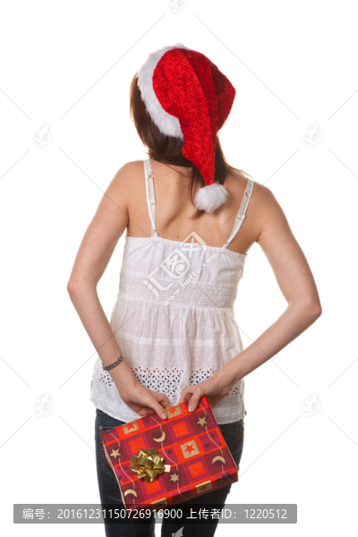 漂亮的年輕女人帶圣誕包