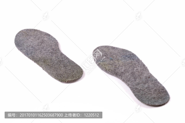 溫暖的灰色羊毛鞋墊的鞋。腳的方便。