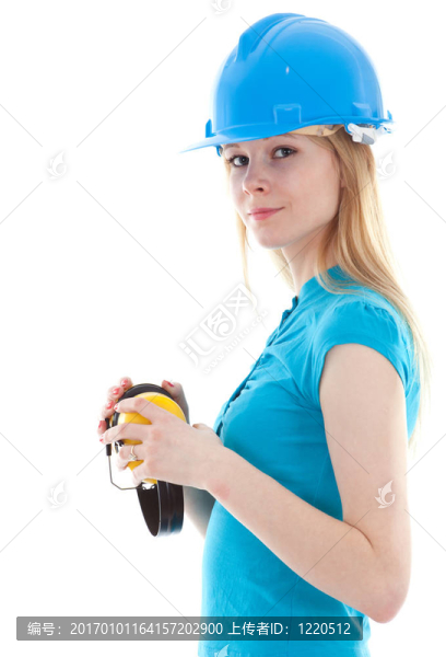 在安全帽的年輕女子保護(hù)接收器