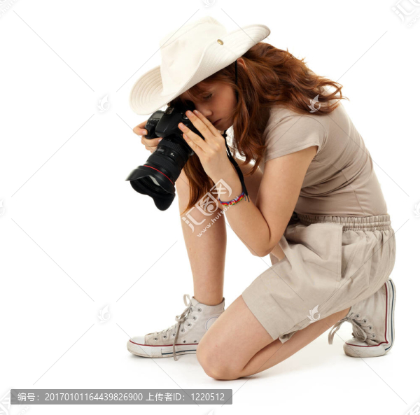 女?dāng)z影師戴專業(yè)數(shù)碼相機帽