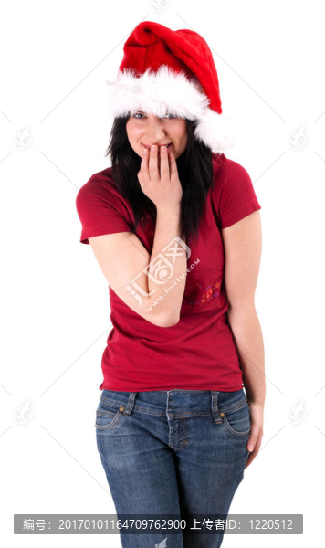 微笑的年輕女子在紅色的圣誕帽和手套