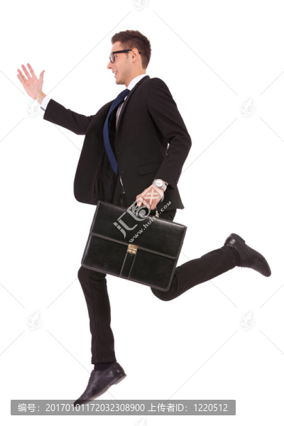 帶眼鏡和手提箱跳的商人