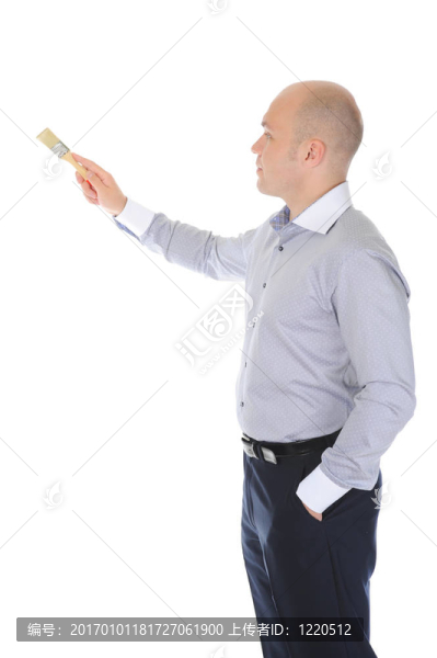商人手里拿著一把刷子