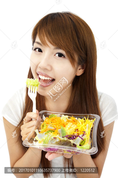亞洲青年婦女拿蔬菜和沙拉