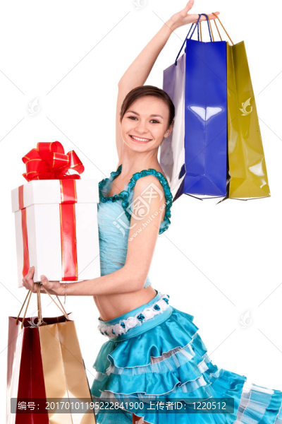 女孩與禮品盒和弓。