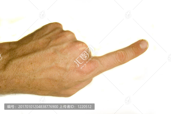 一張男子手指向的股票照片。