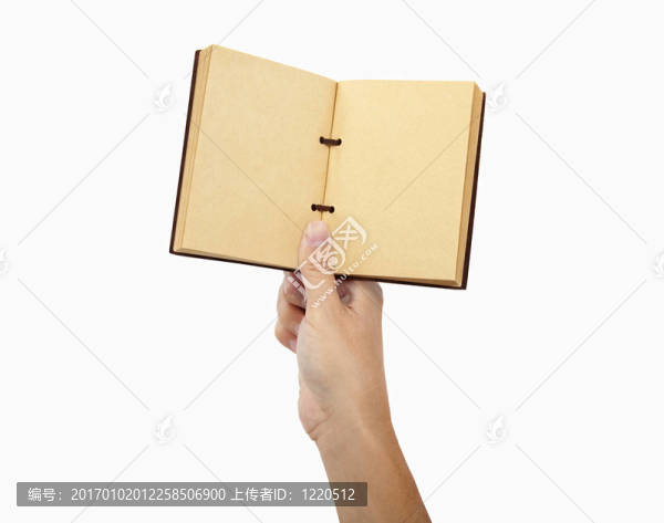 手拿書和孤立的白色