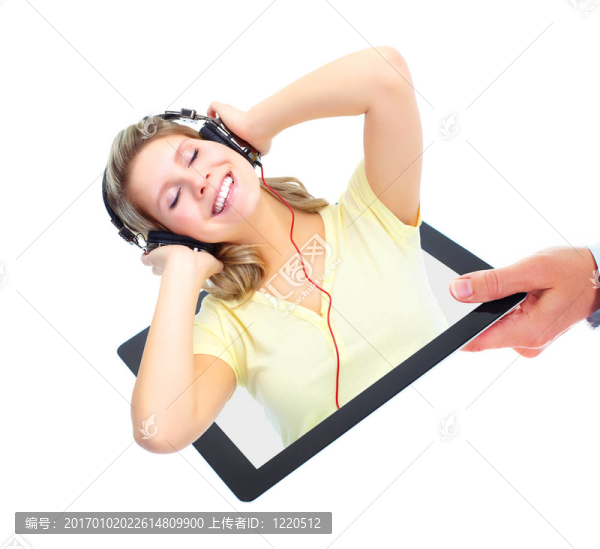 快樂女孩聽音樂。平板電腦。