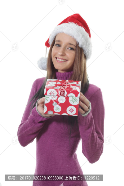 帶圣誕禮物盒的少女