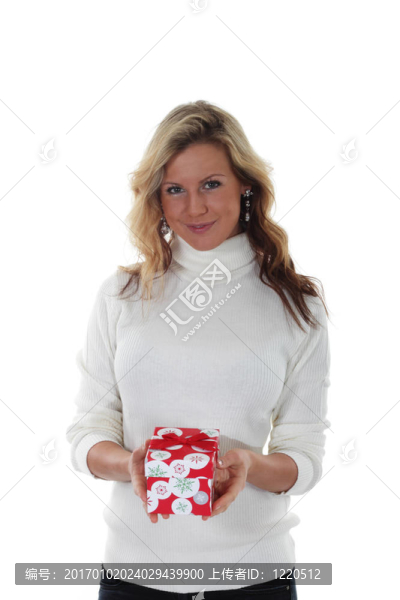 帶圣誕禮物的年輕婦女