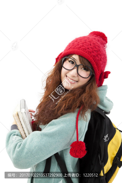 快樂的亞洲青年婦女在冬季帽子和磨損