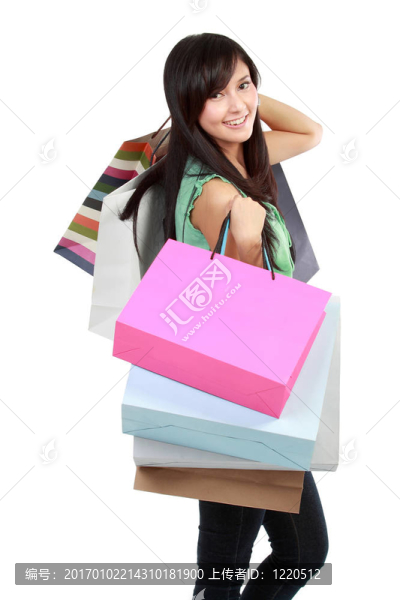 漂亮的；年輕的；手里拿著五顏六色的購物袋的婦女