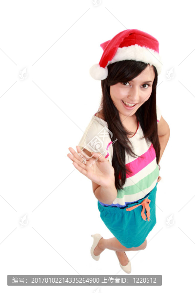 美麗的年輕女子穿著圣誕老人