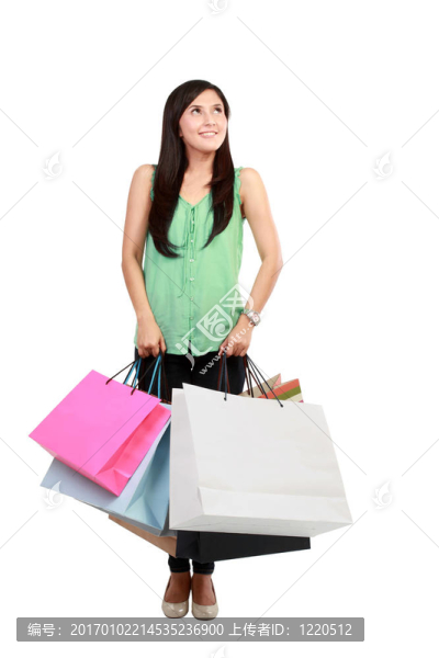 美麗時(shí)尚的女人雙手捧著購(gòu)物袋