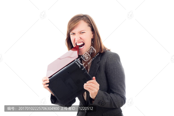 憤怒的商業(yè)女性咬筆記本電腦
