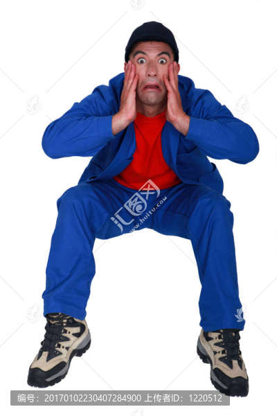 他臉上帶著恐懼的體力勞動者。