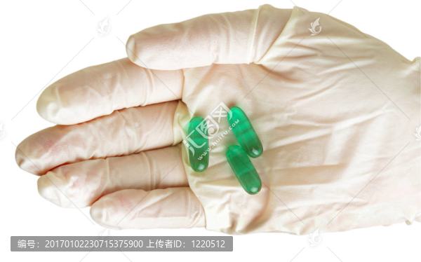 手套和藥丸的手