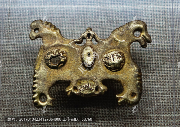 獸面紋四鳥金飾牌,西晉