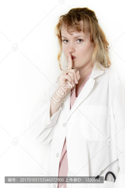 用手指在嘴唇前面的女士醫(yī)生